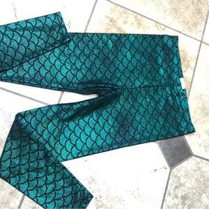 Kolouri way cool mermaid leggings. They are new without the tags. Size Large